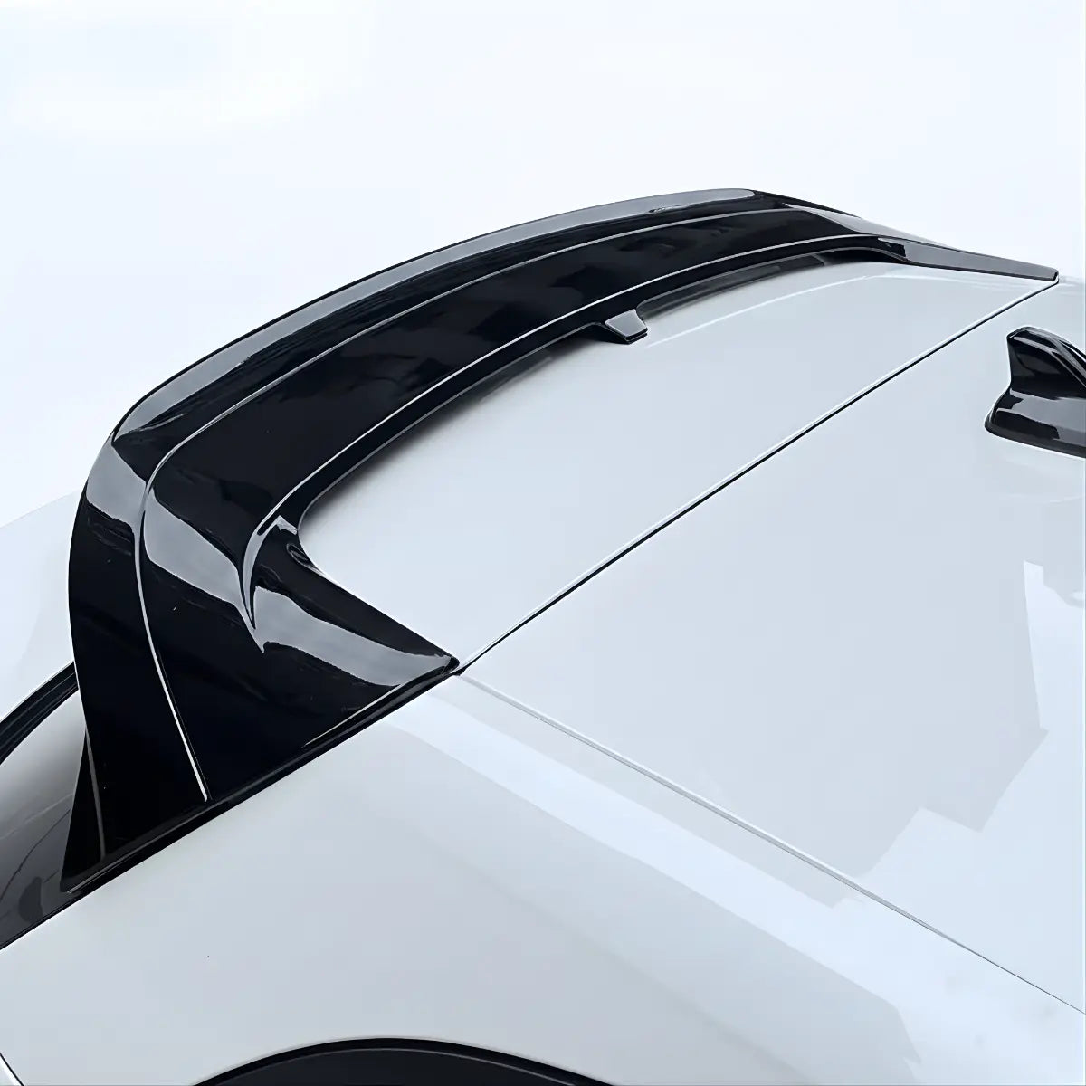 Lur V1 Rear Spoiler/wing on a white Volkswagen GTI MK8 spoiler with a white background
