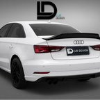 White Audi car with a black Lur Design spoiler on a gray background