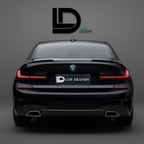 Black BMW car with 'Lur Design' branding on a gray background with Duckbill Spoiler Lip
