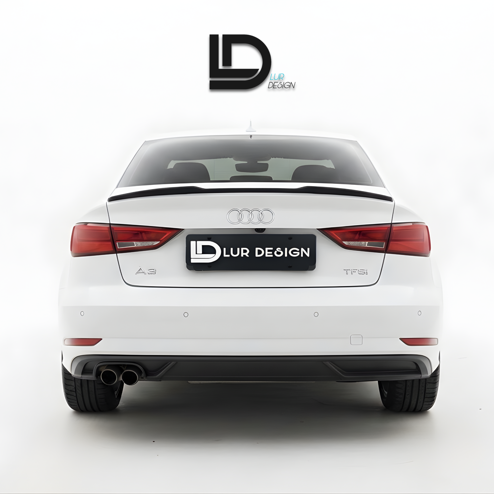 Rear Duckbill Spoiler Cap lip Audi A3 8V Sedan 
White car with a black spoiler on a white background, featuring Lur Design logo.