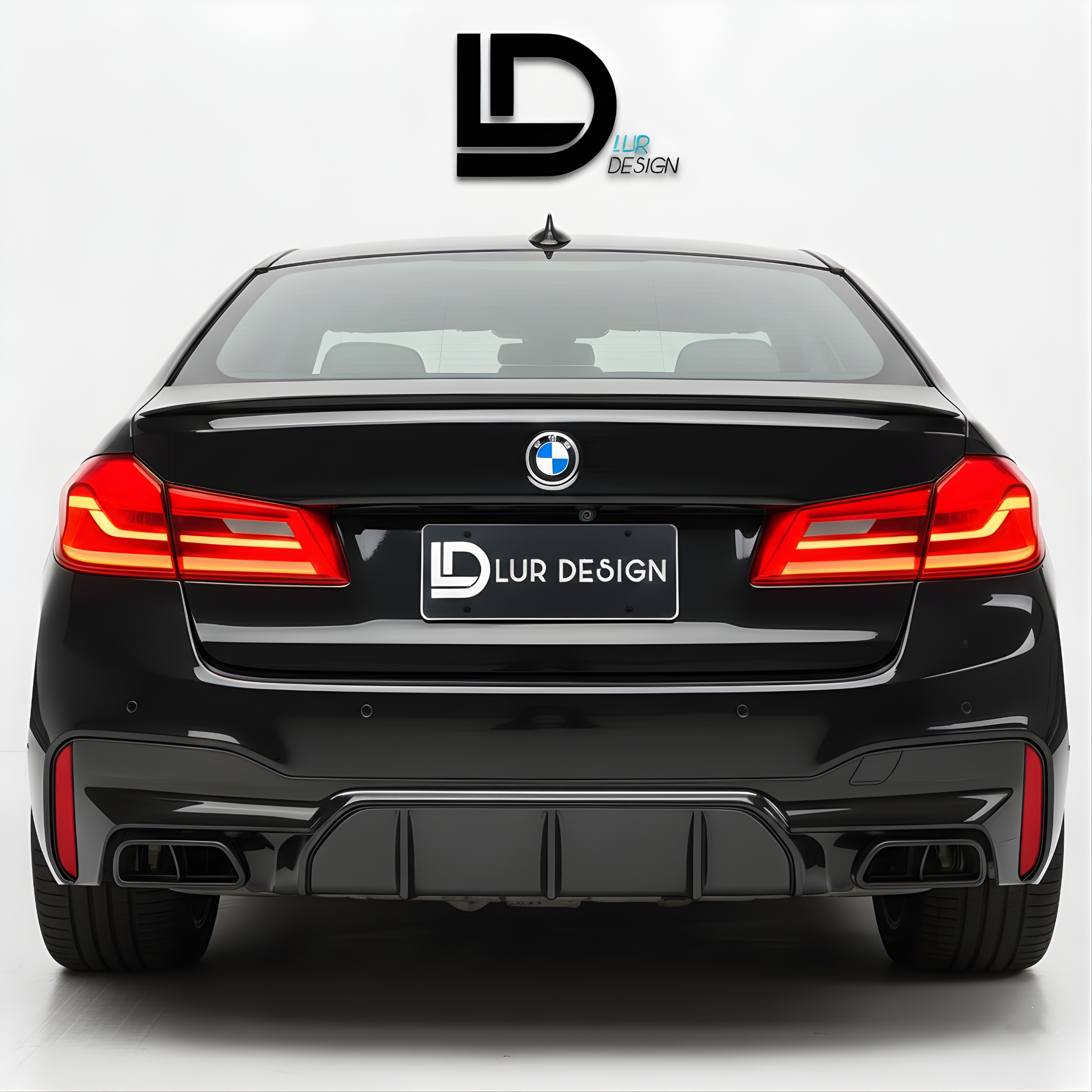 BMW 5 series G30 with Lur Design rear bumper Diffuser valance on a white background