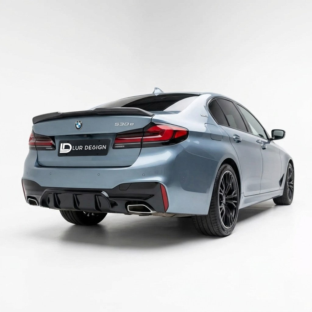 BMW 5 series G30 with Lur Design rear bumper Diffuser valance on a white background