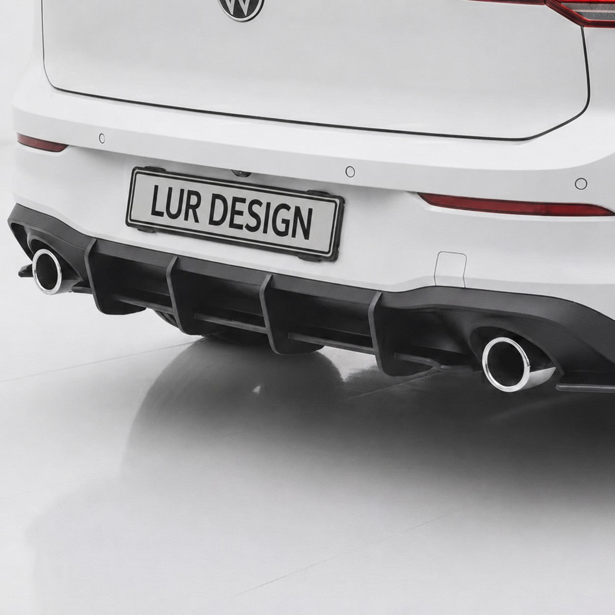 Rear Diffuser Volkswagen Golf 8 GTI
White Volkswagen car with 'LUR DESIGN' on the license plate against a white background